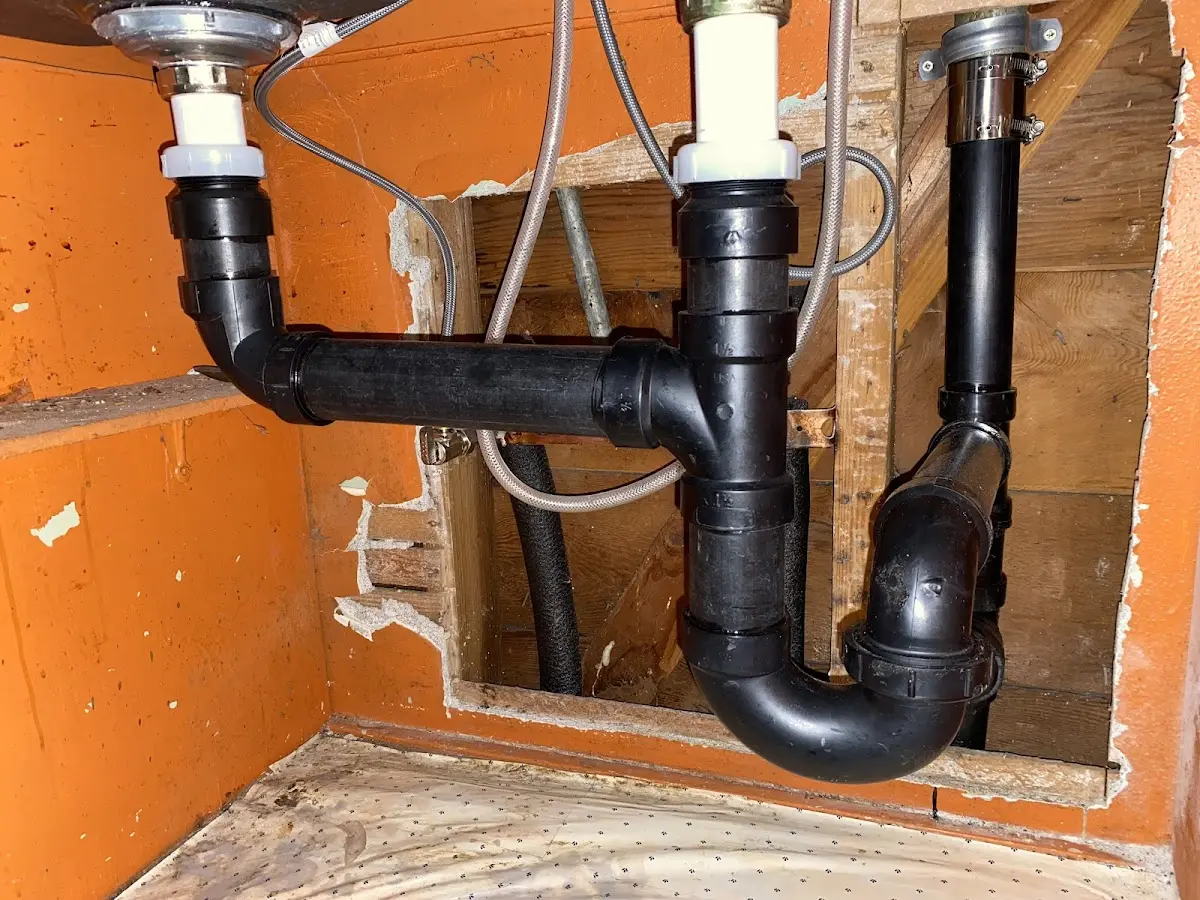 Professional Garbage Disposal Repair equipment and tools on the job in Hammond